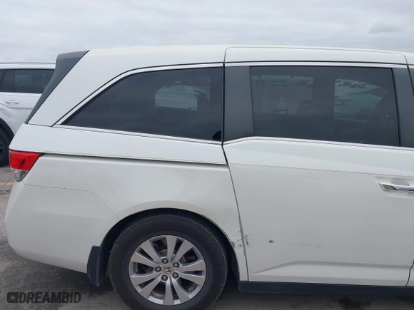 2016 Honda Odyssey EX-L with VIN 5FNRL5H68GB112223, listed as a IAAI auction lot 42056616 with 126,285 mi miles. Bid and sale history available at carsss.com. Image 6.