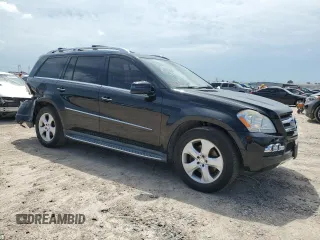 2011 Mercedes-Benz GL-Class GL 450 with VIN 4JGBF7BEXBA708581, listed as a Copart auction lot 69159824 with 151,477 mi miles and Salvage Title. Bid and sale history available at carsss.com. Image 4.