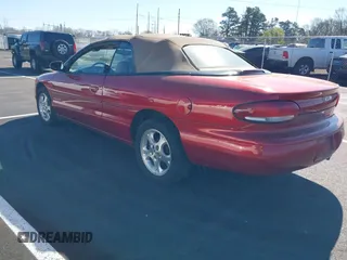 2000 Chrysler Sebring JXi with VIN 3C3EL55H2YT286901, listed as a IAAI auction lot 41868036 with 128,219 mi miles and . Bid and sale history available at DreamBid. Image 3.