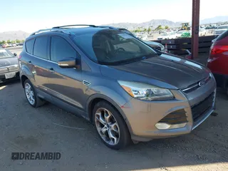 2013 Ford Escape Titanium with VIN 1FMCU0J95DUA29390, listed as a IAAI auction lot 42720269 with 147,413 mi miles and . Bid and sale history available at DreamBid. Image 1.