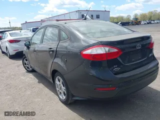 2014 Ford Fiesta SE with VIN 3FADP4BJ0EM150811, listed as a IAAI auction lot 42060983 with 180,952 mi miles. Bid and sale history available at carsss.com. Image 3.