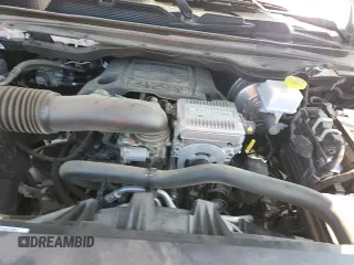 2023 Ram 1500 Big Horn with VIN 1C6SRFMT1PN628076, listed as a Copart auction lot 71742945 with 76,500 mi miles and Salvage title. Bid and sale history available at DreamBid. Image 13.