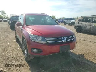 2014 Volkswagen Tiguan SE with VIN WVGAV3AX9EW038118, listed as a Copart auction lot 56329625 with 134,620 mi miles and Salvage title. Bid and sale history available at DreamBid. Image 13.