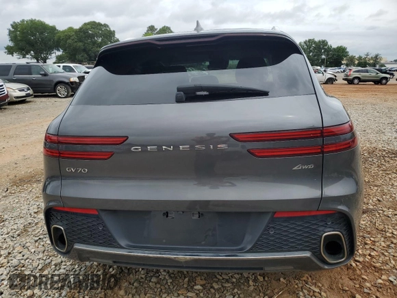 2022 Genesis GV70 2.5T with VIN KMUMADTBXNU030039, listed as a Copart auction lot 58496015 with 63,773 mi miles and Salvage title. Bid and sale history available at DreamBid. Image 6.