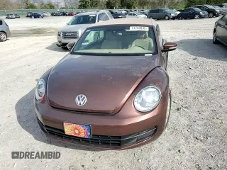 2016 Volkswagen Beetle S with VIN 3VW517AT4GM823250, listed as a Copart auction lot 51788835 with 82,240 mi miles and Salvage Title. Bid and sale history available at DreamBid. Image 11.