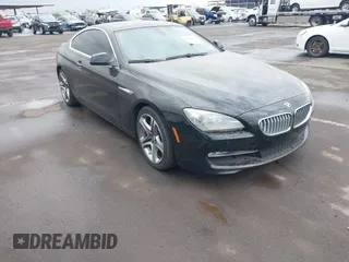 2012 BMW 6 Series 650i with VIN WBALX3C57CDV77359, listed as a IAAI auction lot 41443966 with 64,500 mi miles. Bid and sale history available at carsss.com. Image 1.