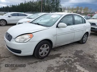 2007 Hyundai Accent GLS with VIN KMHCN46C67U097159, listed as a IAAI auction lot 41913373 with 103,303 mi miles. Bid and sale history available at carsss.com. Image 2.