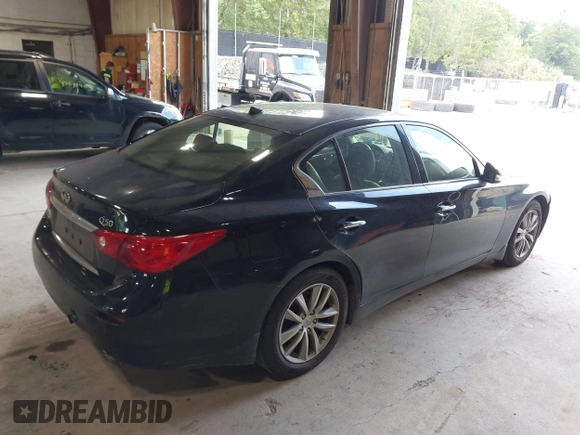 2015 Infiniti Q50 Premium z VIN JN1BV7AR9FM423471, wystawiony jako IAAI lot #42641857 z przebiegiem 86 919 mil mil oraz . Historia ofert i sprzedaży dostępna na DreamBid. Obrazek 4.