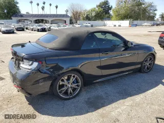 2015 BMW 2 Series M235i with VIN WBA1M1C56FV393730, listed as a Copart auction lot 45348734 with 59,231 mi miles and Salvage Title. Bid and sale history available at carsss.com. Image 3.