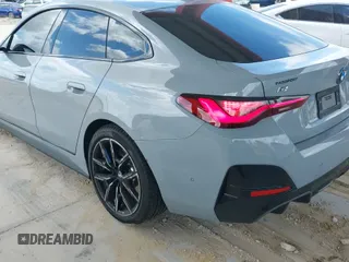 2025 BMW i4 xDrive40 with VIN WBY43HD02SFU51432, listed as a IAAI auction lot 42170392 with 1,602 mi miles and . Bid and sale history available at DreamBid. Image 20.