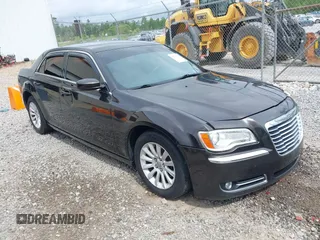 2013 Chrysler 300 with VIN 2C3CCAAG4DH658609, listed as a IAAI auction lot 42343686 with 138,156 mi miles and . Bid and sale history available at DreamBid. Image 1.