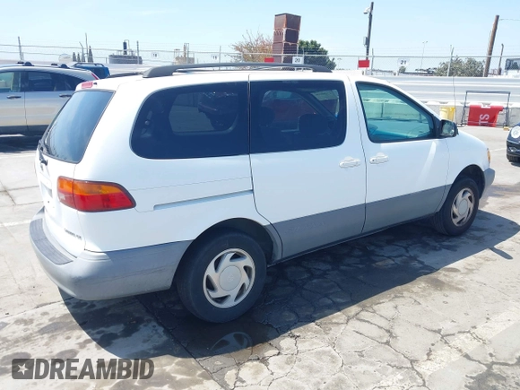 1998 Toyota Sienna LE with VIN 4T3ZF13C2WU066460, listed as a IAAI auction lot 42088006 with 169,014 mi miles and . Bid and sale history available at DreamBid. Image 4.