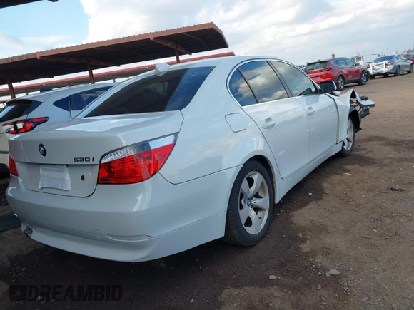 2007 BMW 5 Series 530i with VIN WBANE73537CM56751, listed as a IAAI auction lot 41461577 with 218,059 mi miles. Bid and sale history available at carsss.com. Image 4.