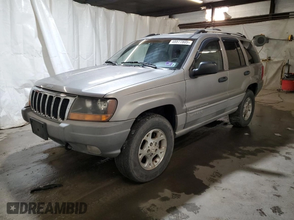 1999 Jeep Grand Cherokee Laredo with VIN 1J4GW58N0XC686845, listed as a Copart auction lot 48877805 with 155,908 mi miles and Clean title. Bid and sale history available at DreamBid. Image 1.