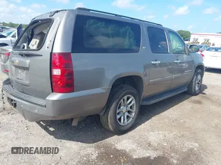 2007 Chevrolet Suburban LS with VIN 1GNFC16J77R260500, listed as a IAAI auction lot 42787990 with 167,163 mi miles and . Bid and sale history available at DreamBid. Image 4.