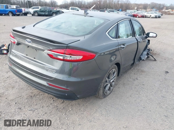 2019 Ford Fusion Hybrid Titanium with VIN 3FA6P0RU9KR158129, listed as a IAAI auction lot 41717104 with 37,736 mi miles. Bid and sale history available at carsss.com. Image 4.