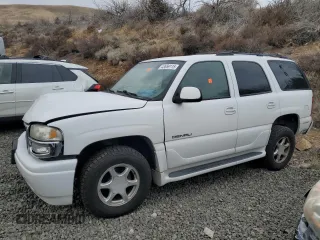 2001 GMC Yukon Denali z VIN 1GKEK63U01J287101, wystawiony jako Copart lot #43659115 z przebiegiem Nie podano mil oraz Szkoda całkowita • Salvage title. Historia ofert i sprzedaży dostępna na DreamBid. Obrazek 1.