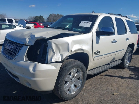 2014 GMC Yukon SLT with VIN 1GKS1CE01ER179379, listed as a IAAI auction lot 41717271 with 136,999 mi miles. Bid and sale history available at carsss.com. Image 17.