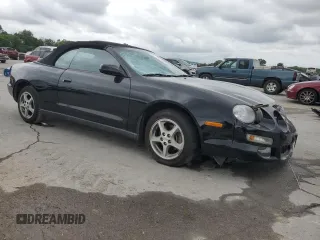 1996 Toyota Celica GT z VIN JT5FG02T3T0031613, wystawiony jako Copart lot #58410225 z przebiegiem 124 899 mil mil oraz Szkoda całkowita • Salvage title. Historia ofert i sprzedaży dostępna na DreamBid. Obrazek 4.