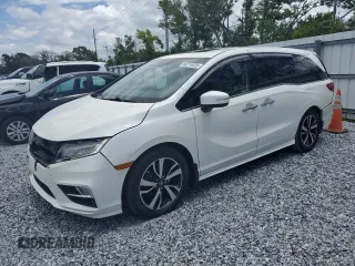 2018 Honda Odyssey Elite z VIN 5FNRL6H9XJB064148, wystawiony jako Copart lot #56214025 z przebiegiem 117 627 mil mil oraz Szkoda całkowita • Salvage title. Historia ofert i sprzedaży dostępna na DreamBid. Obrazek 1.