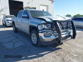 2017 GMC Sierra 1500 SLE with VIN 3GTU2MEC0HG202074, listed as a IAAI auction lot 42067320 with 184,424 mi miles and . Bid and sale history available at DreamBid. Image 1.