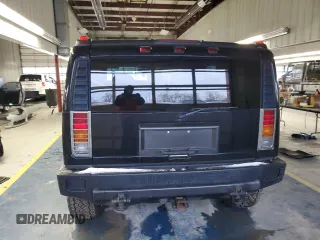 2003 Hummer H2 with VIN 5GRGN23U73H116472, listed as a Copart auction lot 86919214 with 172,543 mi miles and Salvage Title. Bid and sale history available at carsss.com. Image 6.