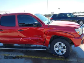 2014 Toyota Tacoma PreRunner with VIN 3TMKU4HN4EM041871, listed as a IAAI auction lot 41641763 with 148,968 mi miles and . Bid and sale history available at DreamBid. Image 6.