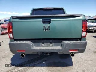 2022 Honda Ridgeline RTL-E with VIN 5FPYK3F73NB014672, listed as a Copart auction lot 54617475 with 76,160 mi miles and Salvage title. Bid and sale history available at DreamBid. Image 6.