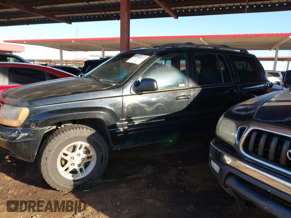 1999 Jeep Grand Cherokee Limited with VIN 1J4GW68N6XC675399, listed as a IAAI auction lot 41745815 with 217,800 mi miles. Bid and sale history available at carsss.com. Image 14.