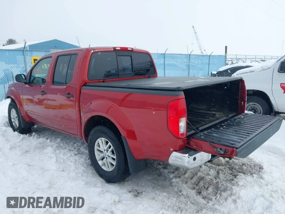 2014 Nissan Frontier SV with VIN 1N6AD0EV3EN726763, listed as a IAAI auction lot 41561599 with 131,893 mi miles and . Bid and sale history available at DreamBid. Image 3.