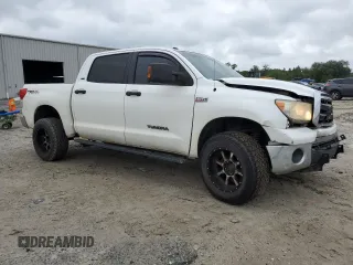 2011 Toyota Tundra 4WD Truck with VIN 5TFDW5F17BX202907, listed as a Copart auction lot 71407364 with 227,988 mi miles and Salvage Title. Bid and sale history available at carsss.com. Image 4.