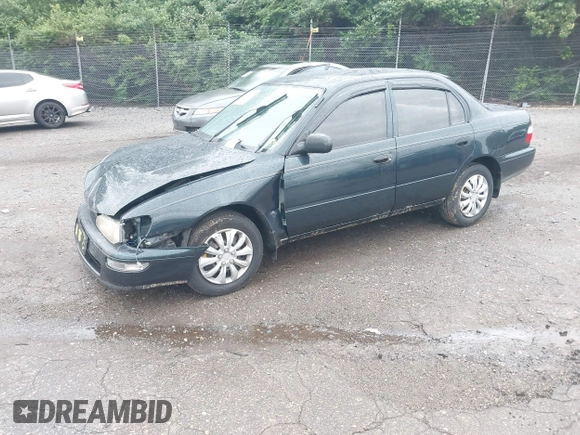 1997 Toyota Corolla with VIN 2T1BA02E2VC211034, listed as a IAAI auction lot 42253359 with 201,451 mi miles and . Bid and sale history available at DreamBid. Image 2.