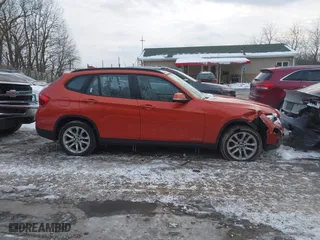 2015 BMW X1 xDrive28i with VIN WBAVL1C51FVY33650, listed as a IAAI auction lot 41400985 with 132,484 mi miles. Bid and sale history available at carsss.com. Image 14.