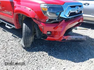 2014 Toyota Tacoma with VIN 5TFLU4EN4EX095917, listed as a IAAI auction lot 41820691 with 59,823 mi miles and . Bid and sale history available at DreamBid. Image 6.