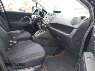 2015 Mazda 5 Sport with VIN JM1CW2BL2F0190990, listed as a IAAI auction lot 42532210 with 98,528 mi miles and . Bid and sale history available at DreamBid. Image 5.