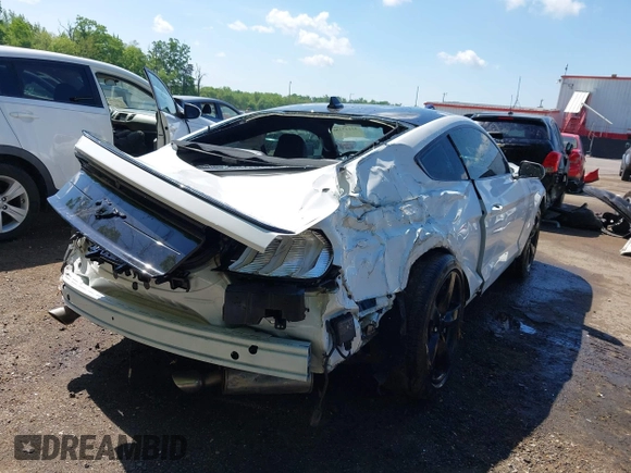 2021 Ford Mustang EcoBoost with VIN 1FA6P8TH6M5148562, listed as a IAAI auction lot 42147236 with 57,050 mi miles and . Bid and sale history available at DreamBid. Image 6.