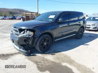 2013 Dodge Durango SXT with VIN 1C4RDJAG2DC530407, listed as a IAAI auction lot 41837441 with 133,375 mi miles and . Bid and sale history available at DreamBid. Image 17.