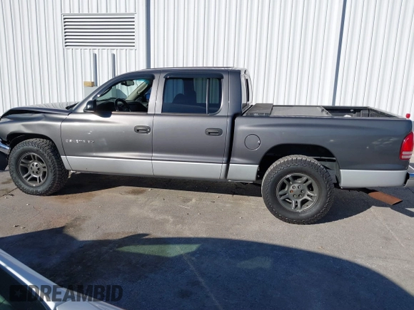 2001 Dodge Dakota Sport with VIN 1B7HL2AN21S319390, listed as a IAAI auction lot 40836729 with 118,823 mi miles. Bid and sale history available at carsss.com. Image 14.