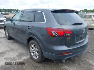 2014 Mazda CX-9 Touring z VIN JM3TB2CAXE0445450, wystawiony jako IAAI lot #42477260 z przebiegiem 139 583 mil mil oraz . Historia ofert i sprzedaży dostępna na DreamBid. Obrazek 3.