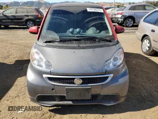 2014 Smart fortwo Passion z VIN WMEEJ9AA6EK792201, wystawiony jako Copart lot #74756574 z przebiegiem 17 282 mil mil oraz Szkody całkowita. Historia ofert i sprzedaży dostępna na DreamBid. Obrazek 5.