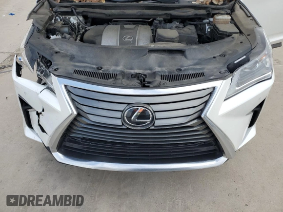 2019 Lexus RX 350L Premium z VIN JTJGZKCA3K2013690, wystawiony jako Copart lot #87411394 z przebiegiem 97 430 mil mil oraz Szkoda całkowita • Salvage title. Historia ofert i sprzedaży dostępna na DreamBid. Obrazek 11.