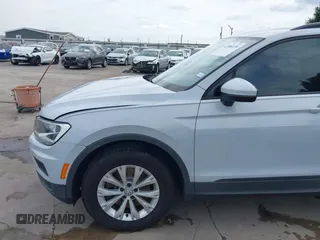 2018 Volkswagen Tiguan S with VIN 3VV1B7AX0JM092116, listed as a IAAI auction lot 42388339 with 103,412 mi miles and . Bid and sale history available at DreamBid. Image 19.