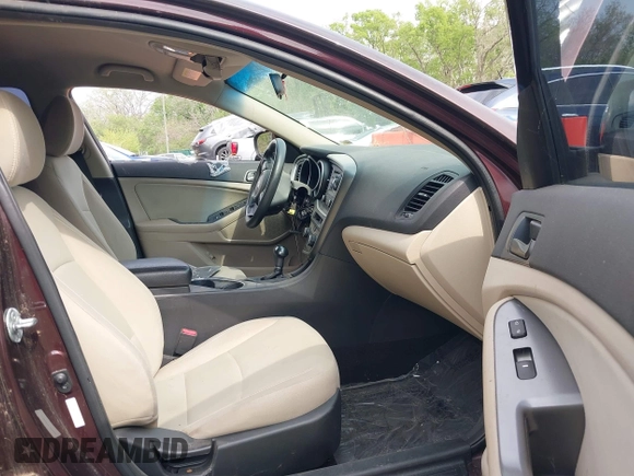 2015 Kia Optima LX with VIN 5XXGM4A79FG494002, listed as a IAAI auction lot 42082041 with 179,076 mi miles. Bid and sale history available at carsss.com. Image 5.