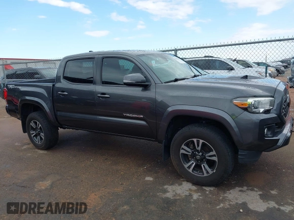 2018 Toyota Tacoma SR5 with VIN 3TMAZ5CN0JM061233, listed as a IAAI auction lot 41944668 with 94,314 mi miles and . Bid and sale history available at DreamBid. Image 13.