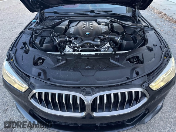 2020 BMW 8 Series M850i with VIN WBAGV8C08LBP48642, listed as a IAAI auction lot 41346377 with 141,651 mi miles. Bid and sale history available at carsss.com. Image 10.