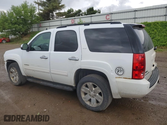 2011 GMC Yukon SLT z VIN 1GKS2CE00BR150352, wystawiony jako Copart lot #61031085 z przebiegiem 258 142 mil mil oraz Czysty tytuł • Clean title. Historia ofert i sprzedaży dostępna na DreamBid. Obrazek 2.