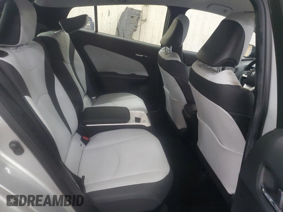 2017 Toyota Prius Plus z VIN JTDKARFP9H3034575, wystawiony jako Copart lot #57501125 z przebiegiem 82 647 mil mil oraz Szkoda całkowita • Salvage title. Historia ofert i sprzedaży dostępna na DreamBid. Obrazek 10.