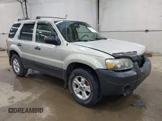 2005 Ford Escape XLT with VIN 1FMYU03115KA29039, listed as a IAAI auction lot 42159988 with 240,047 mi miles and . Bid and sale history available at DreamBid. Image 1.