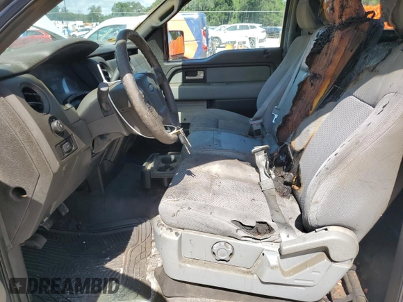 2014 Ford F-150 XL with VIN 1FTNF1CF6EKD16492, listed as a Copart auction lot 64820745 with 209,629 mi miles and Salvage title. Bid and sale history available at DreamBid. Image 7.