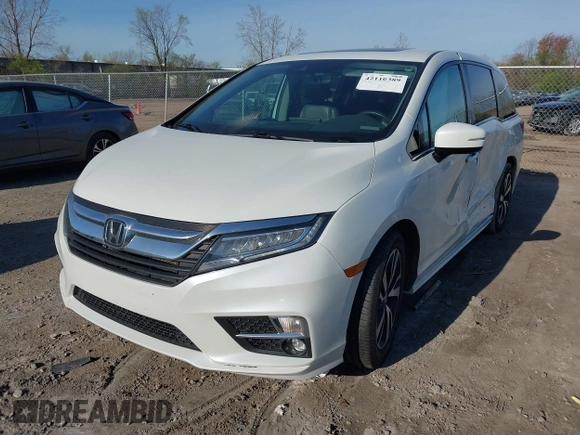 2020 Honda Odyssey Elite with VIN 5FNRL6H92LB014671, listed as a IAAI auction lot 42110389 with 104,180 mi miles and . Bid and sale history available at DreamBid. Image 17.